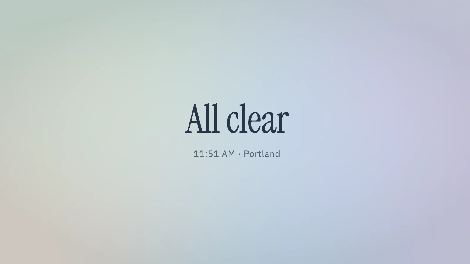 All Clear in its calm state: the words All clear set large in a condensed serif on a soft pastel field of green and lilac, with the time and the place, 11:51 AM, Portland, beneath.